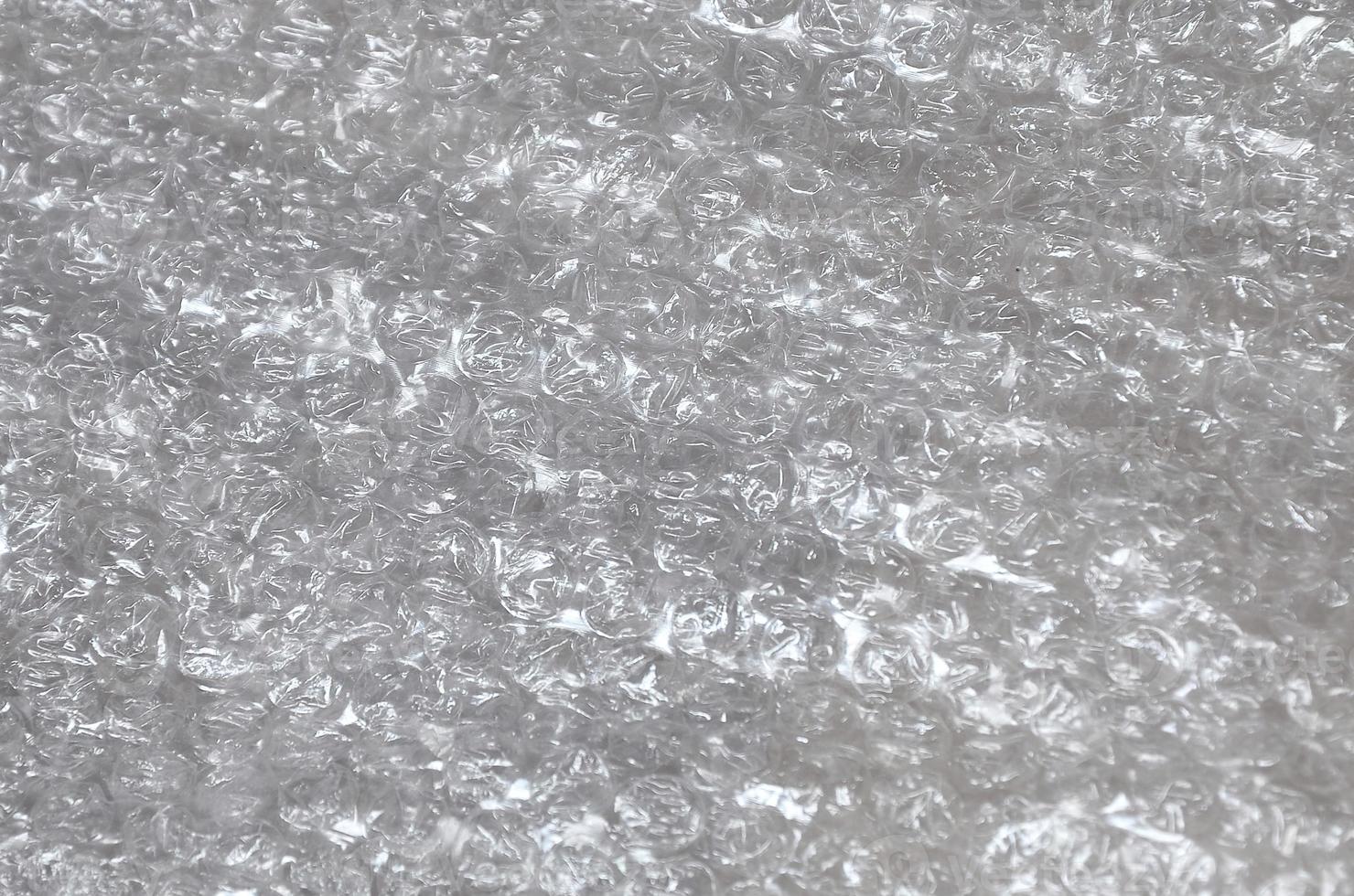 White bubble Wrap Packing Or Air Cushion material. Abstract Texture For Creative Art Work, Close Up dfckground, Top View with Copy Space photo