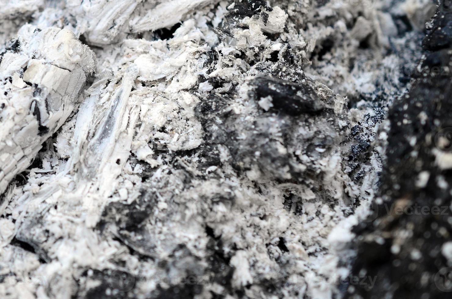 Pile of ashes after the fire went out grunge background texture photo