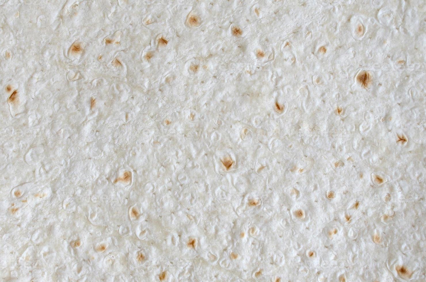Homemade flat pita bread Turkish lavash background texture top view