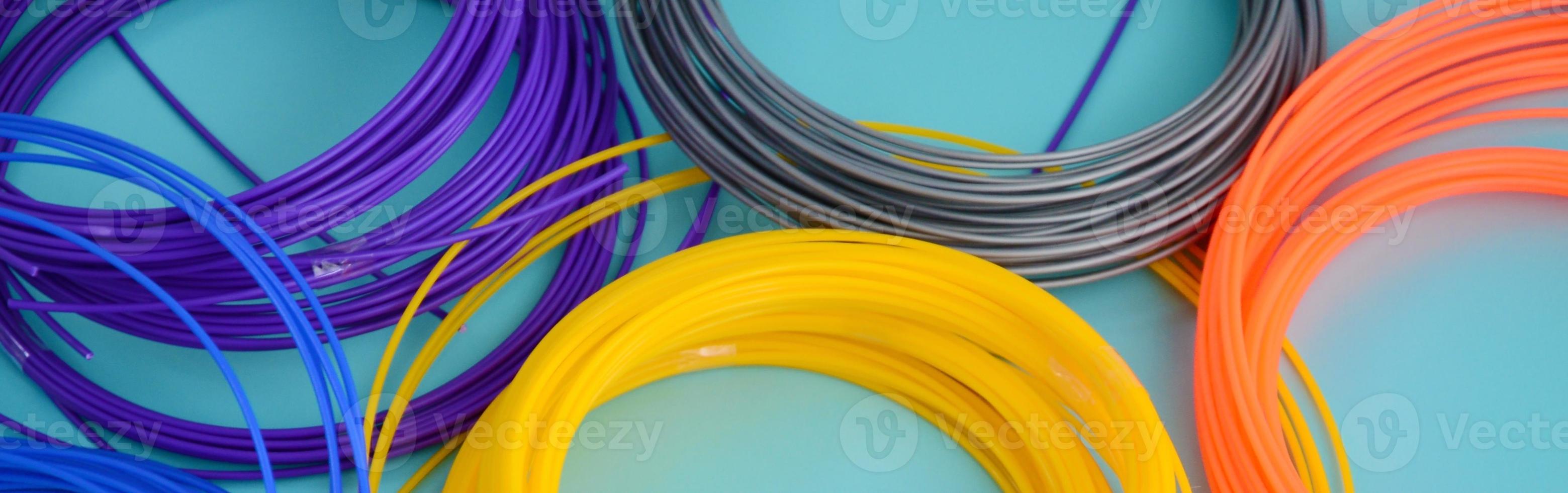 Plastic PLA and ABS filament material for printing on a 3D pen or printer of various colors photo