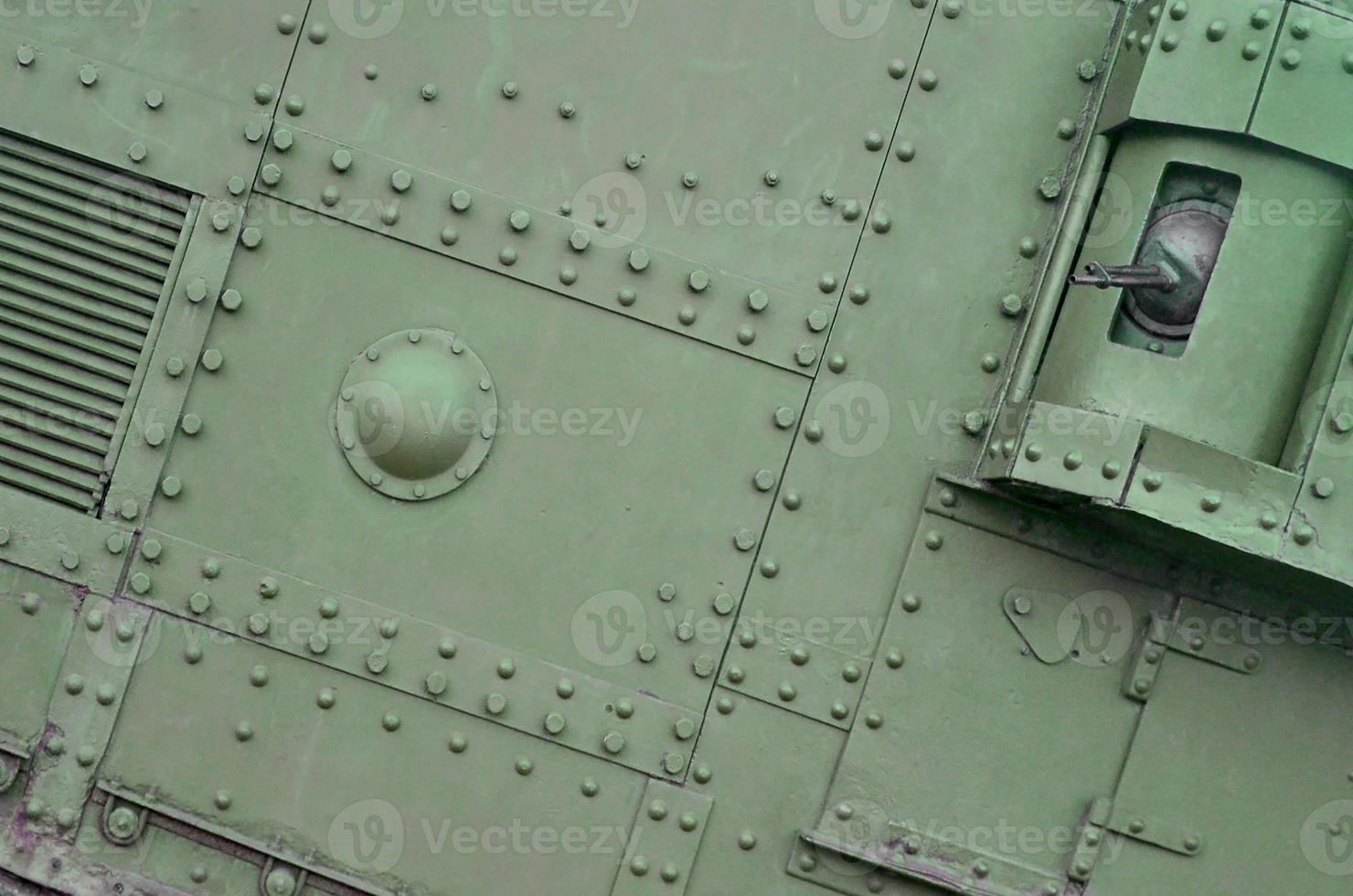 Abstract green industrial metal textured background with rivets and bolts photo