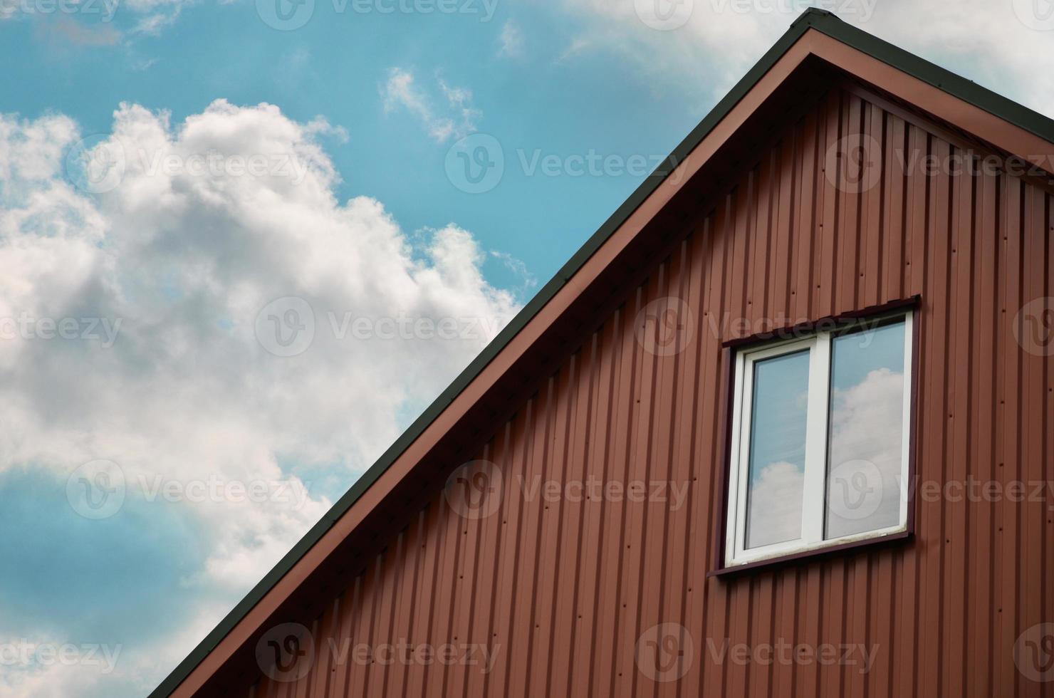 Attic with a small window photo