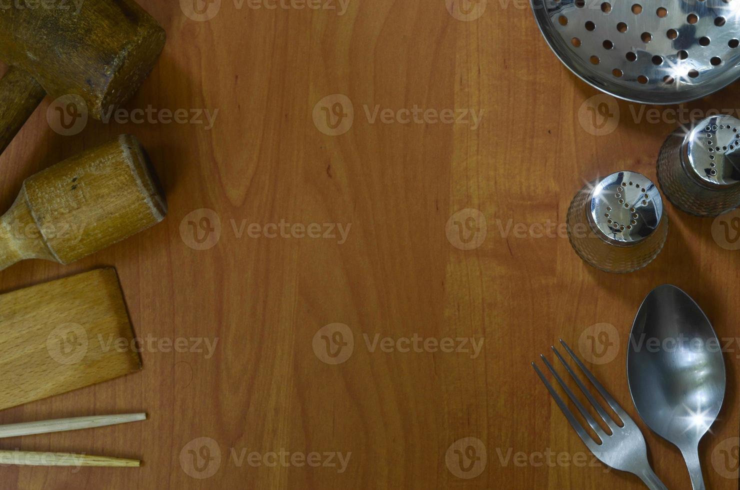 Kitchen appliances on wood background with space for text photo