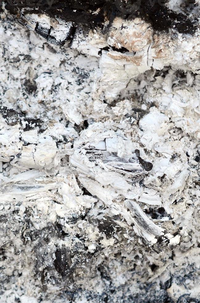 Pile of ashes after the fire went out grunge background texture photo