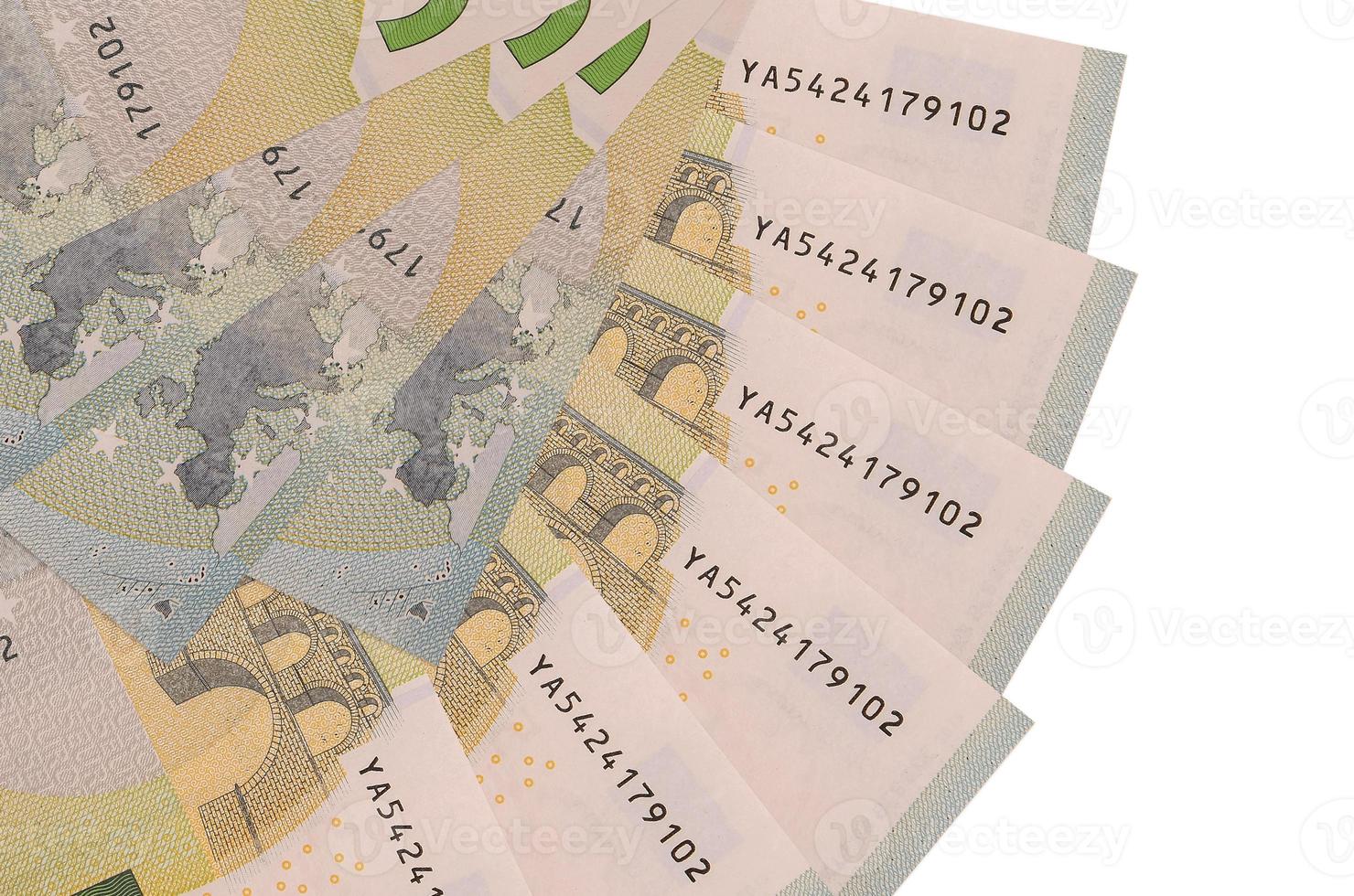 5 euro bills lies isolated on white background with copy space stacked in fan shape close up photo