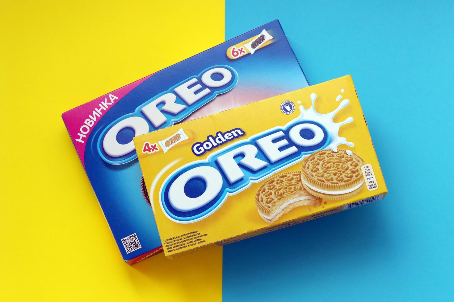 TERNOPIL, UKRAINE - MAY 28, 2022 Oreo golden and strawberry cheesecake crispy cookie box. The brand Oreo is owned by company Mondelez international photo