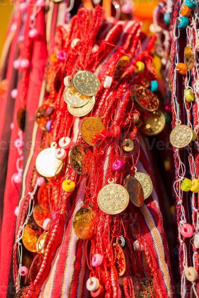 Fake gold coins are on the scarf edges 14511231 Stock Photo at Vecteezy