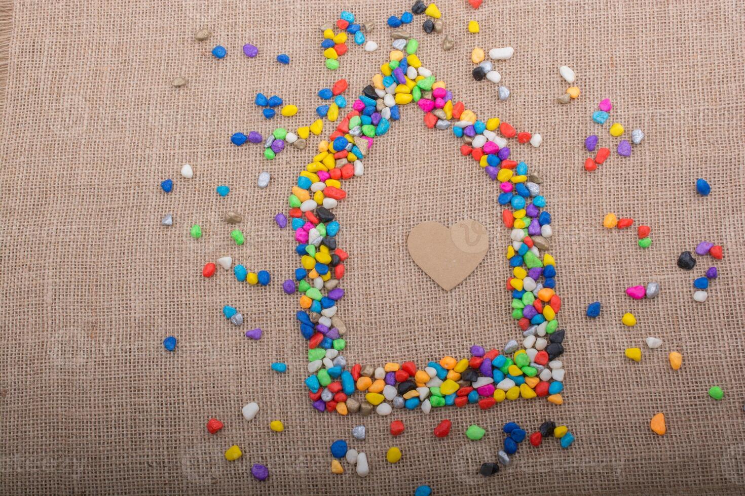 Heart in the house form shaped by pebbles 14513100 Stock Photo at Vecteezy