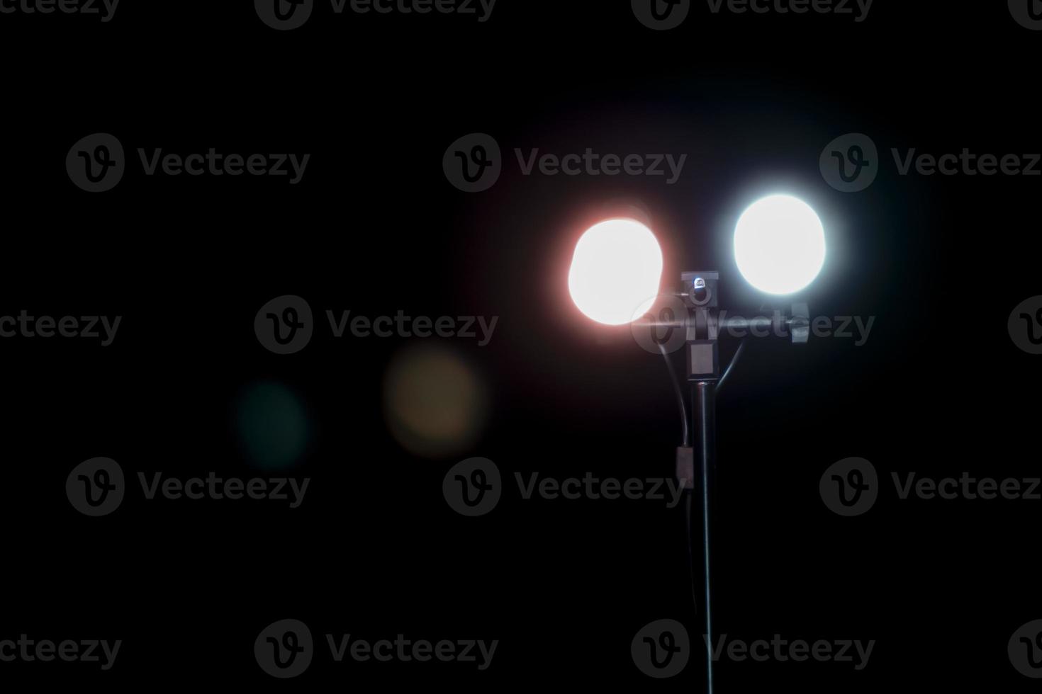 two light rays in the dark background, light stand photography photo