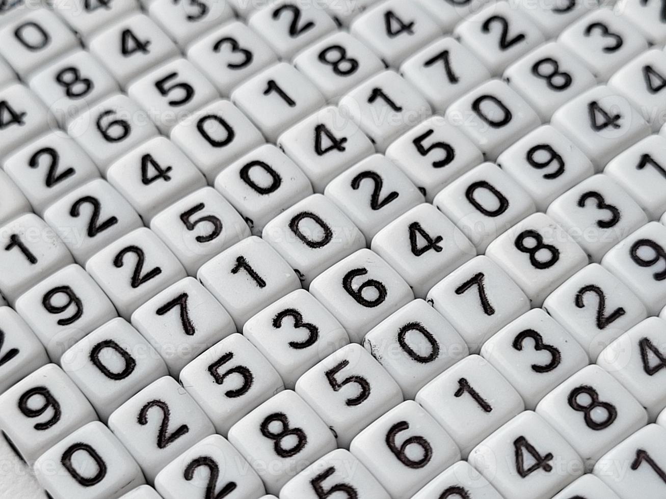 Colorful wooden numbers background. Numbers texture abstraction. Global economy crisis concept. photo