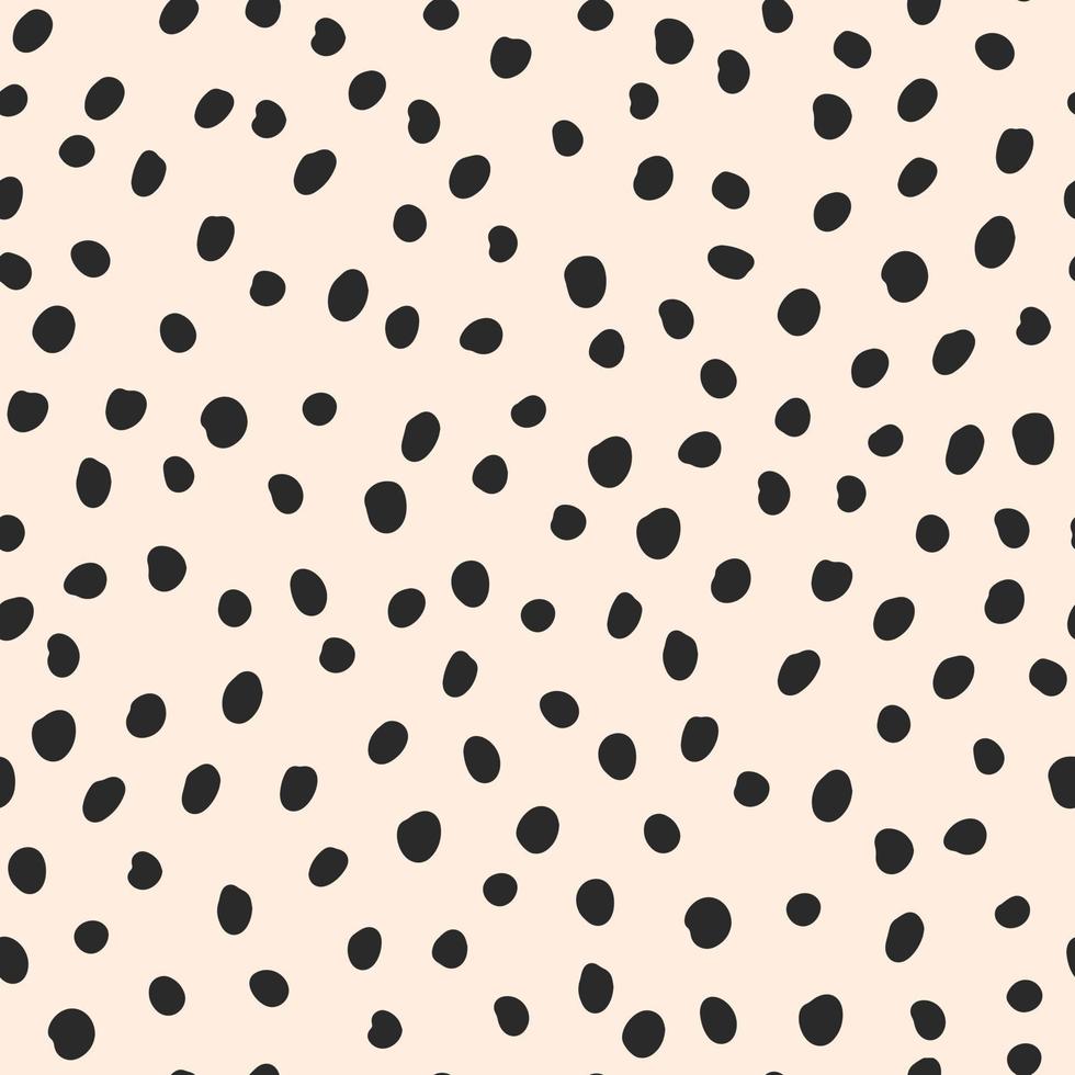 Cute black hand drawn polka dot on beige background. Vector seamless jumble brush spots pattern. Random dots, circles, animal skin. Design for fabric, wallpaper, textile, wrapping paper, packaging