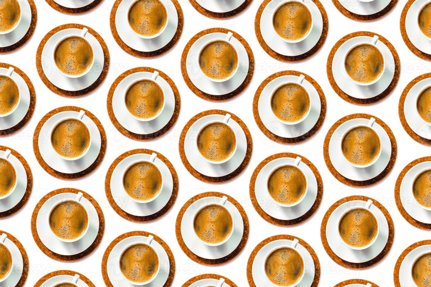 Pattern of coffee cups on white background. photo
