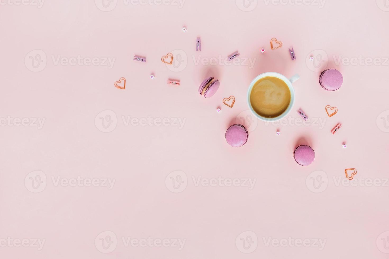 Card with peonies and macaroons and coffee with hearts. photo