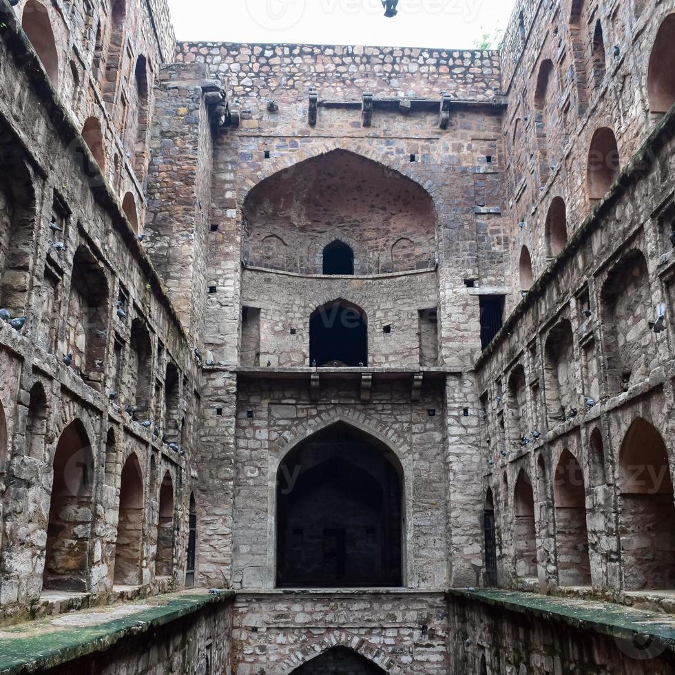 Agrasen Ki Baoli Step Well situated in the middle of Connaught placed New Delhi India, Old Ancient archaeology Construction photo