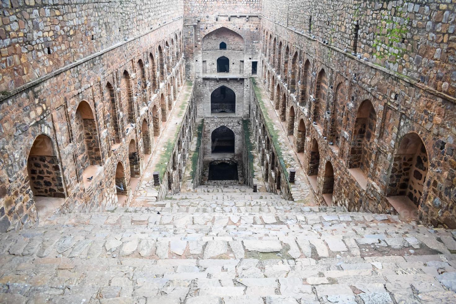 Agrasen Ki Baoli Step Well situated in the middle of Connaught placed New Delhi India, Old Ancient archaeology Construction photo