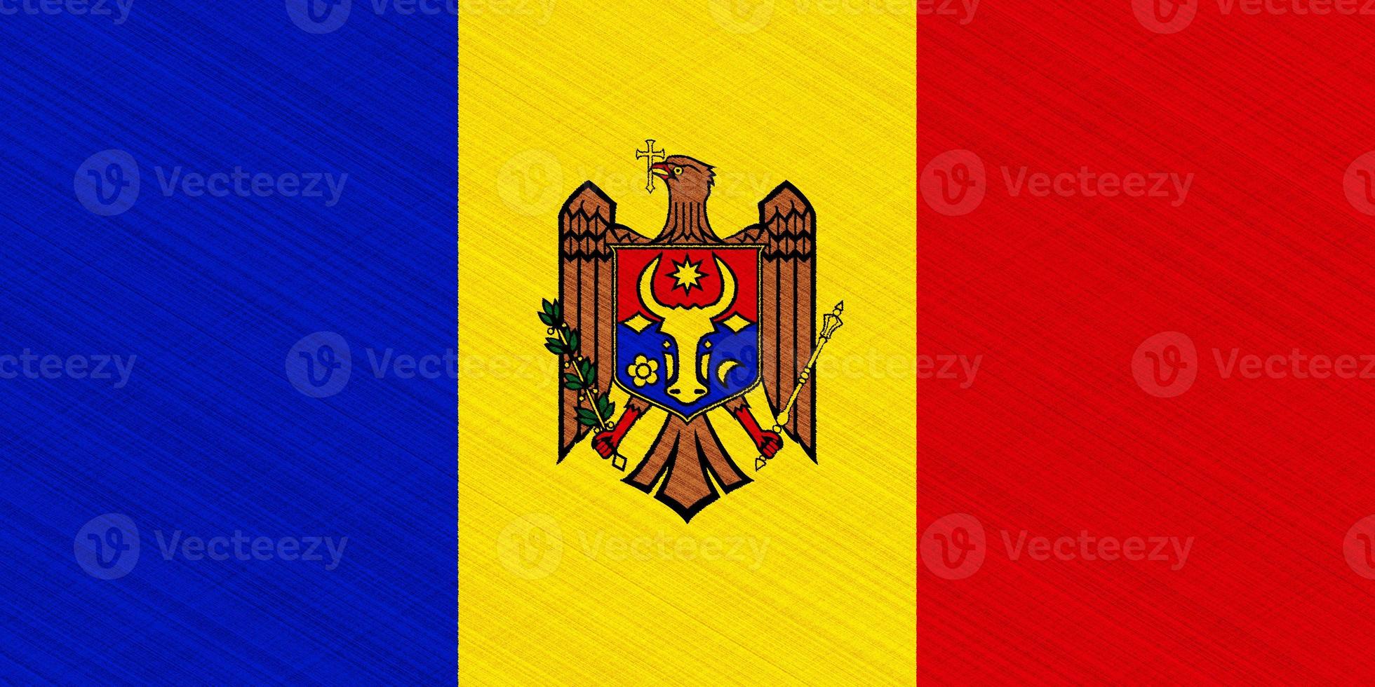 Flag and coat of arms of Moldova on a textured background. Concept collage. photo