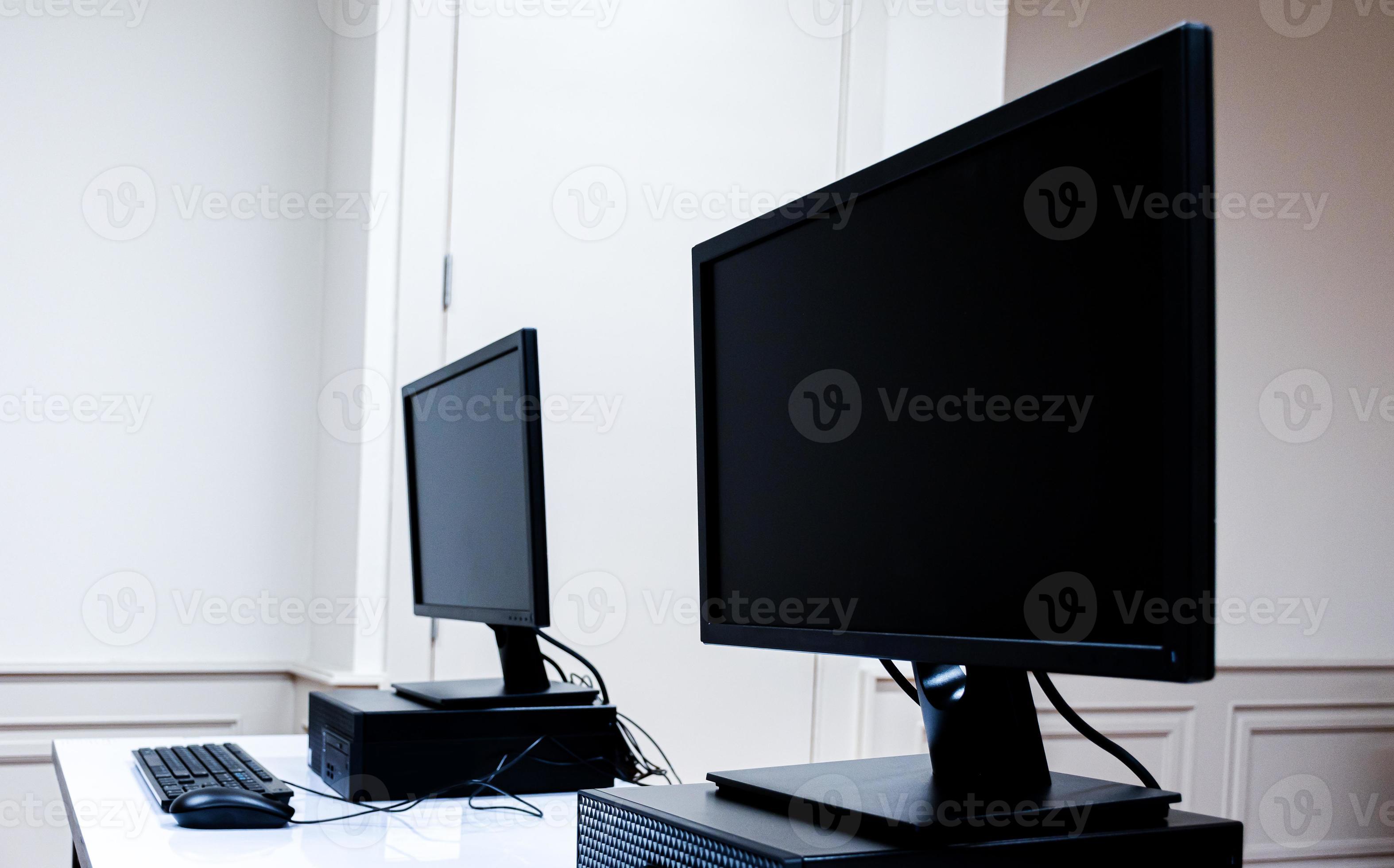 Monitor computer on table in computer classroom 14537426 Stock Photo at