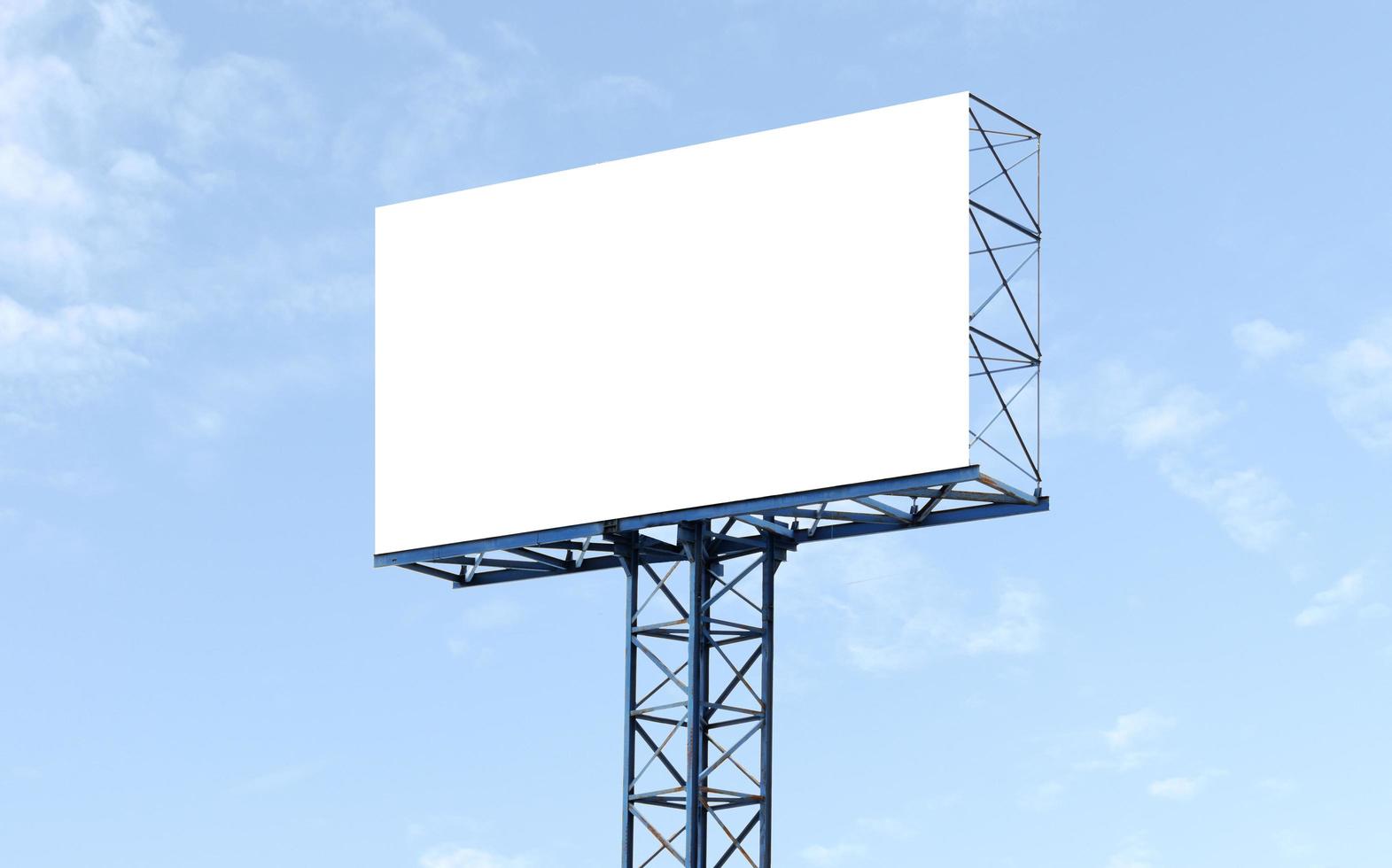 Outdoor billboard on blue sky background with white background mock up. clipping path photo