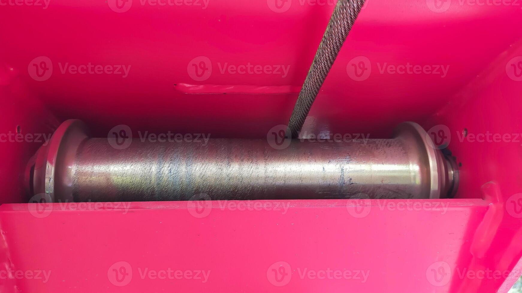 Crane sling roller attach to the crane with a single sling mechanism. photo