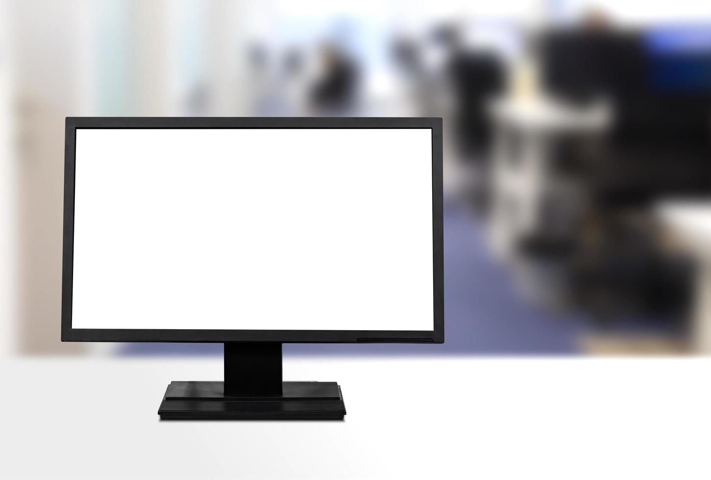 Blank screen desktop computer in office room with copy space photo