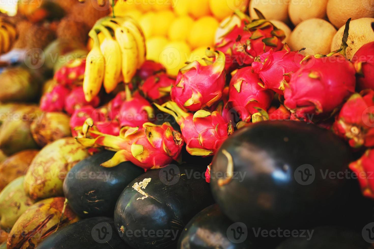 Unidentified man woman at his fruit and or vegetables shop in the main market of the city, in south of India, Asia photo