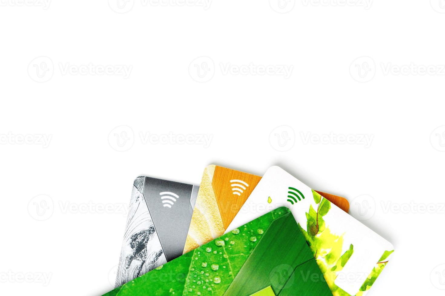 Credit cards with contactless payment. Pile of credit cards on white isolated background photo