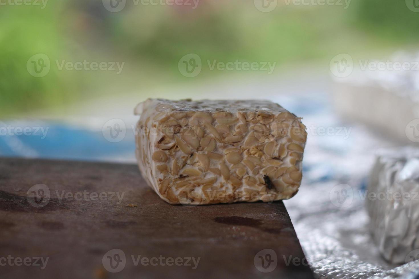 Sliced tempeh, a healthy vegan food alternative, made from soybeans. photo