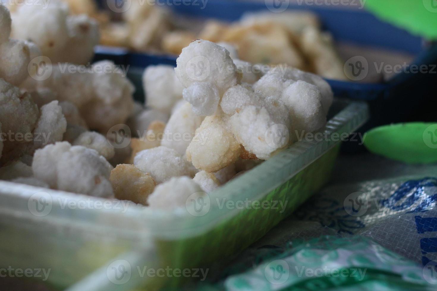 Geblek or cenolan is a traditional food from salaman, Magelang, made from tapioca flour and seasoned with savory fried onions. photo