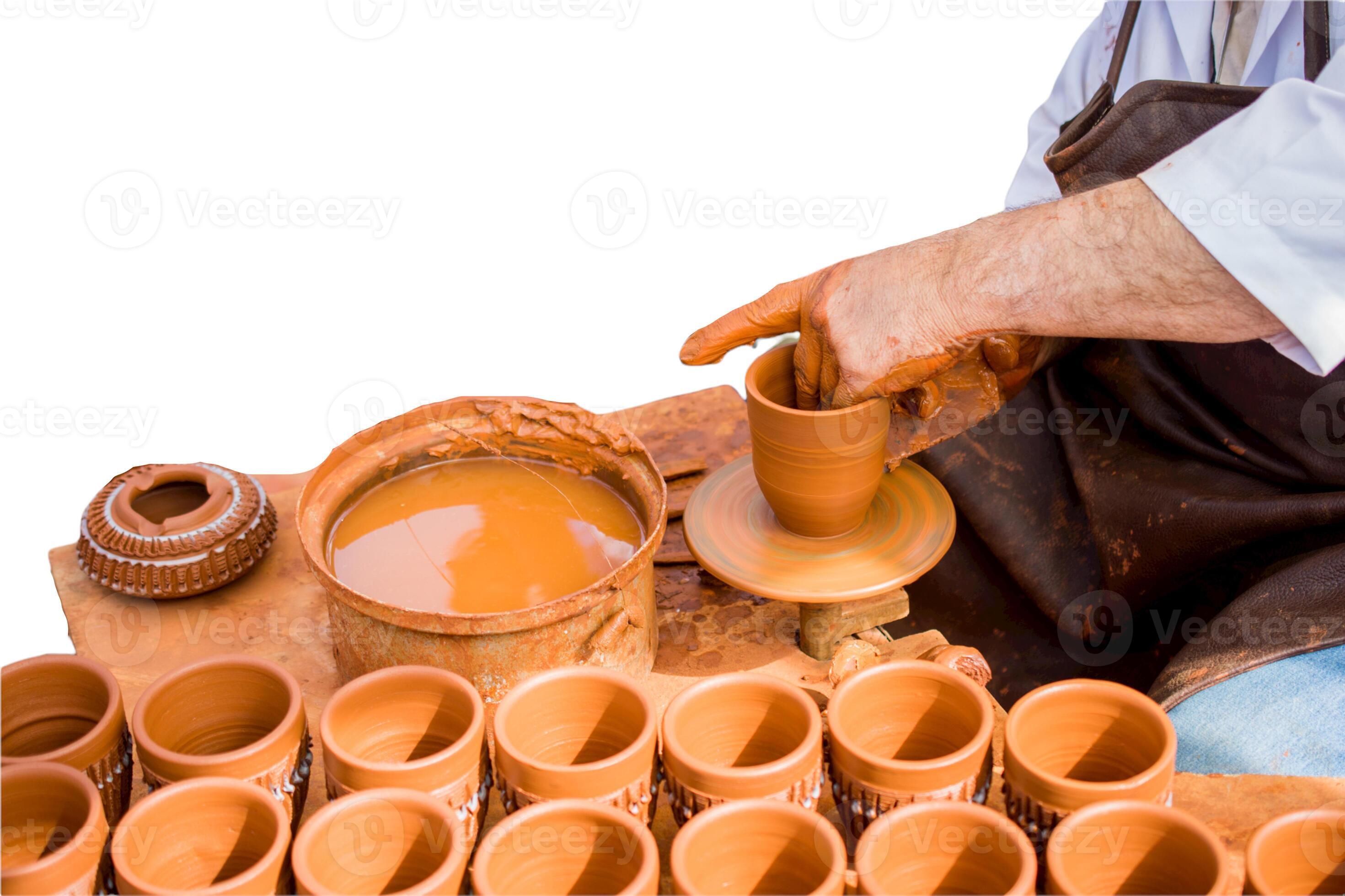Hands work on pottery workshop. Clay bowl spinning on pottery wheel.  14546179 Stock Photo at Vecteezy