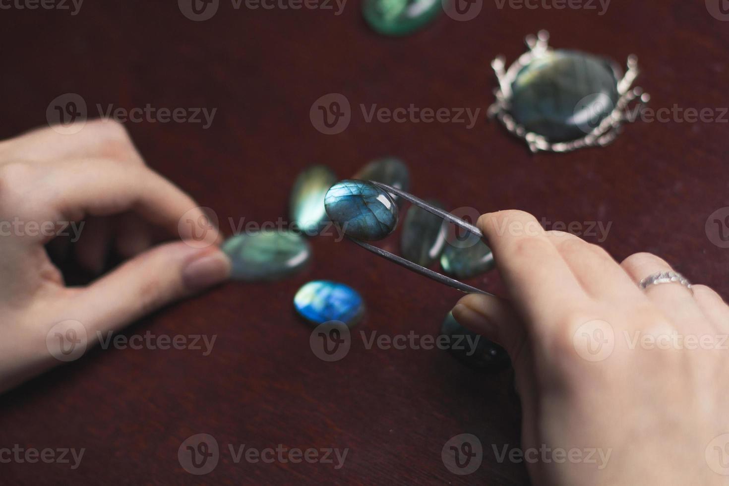Close up gem stone examine concept photo