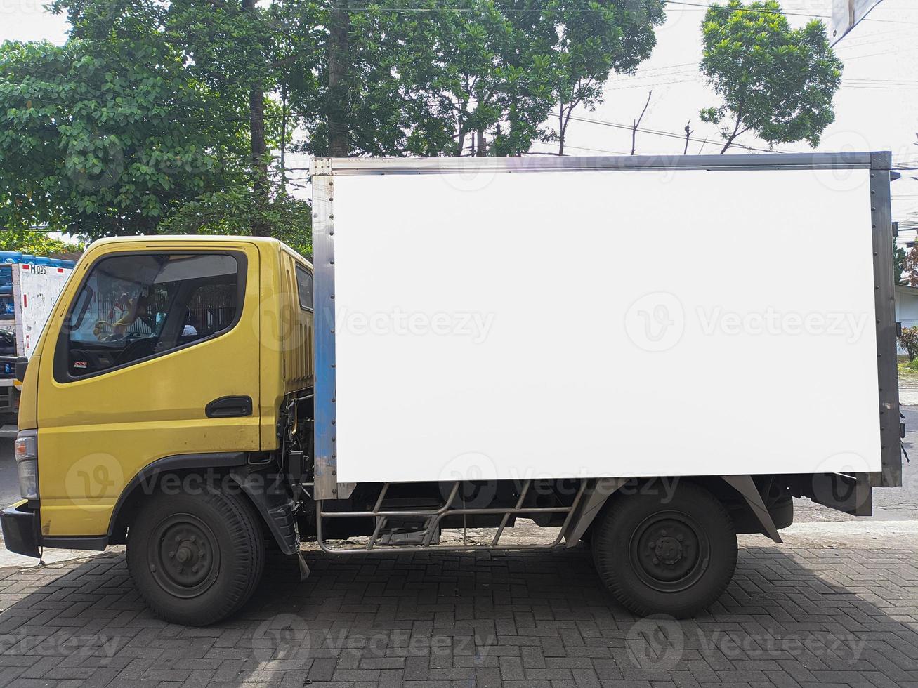 side of shipper box in truck car with blank billboard mockup, blank ad poster template, information banner placeholder mock up photo