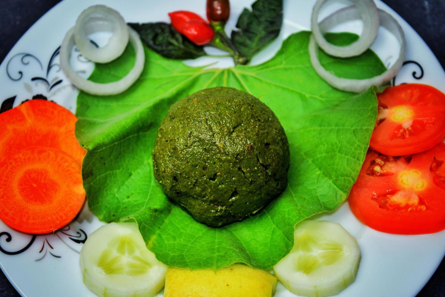 Bangali traditional food Gourd leaf filling. Location - Bogura, Bangladesh. Date - 18 November 2022. photo