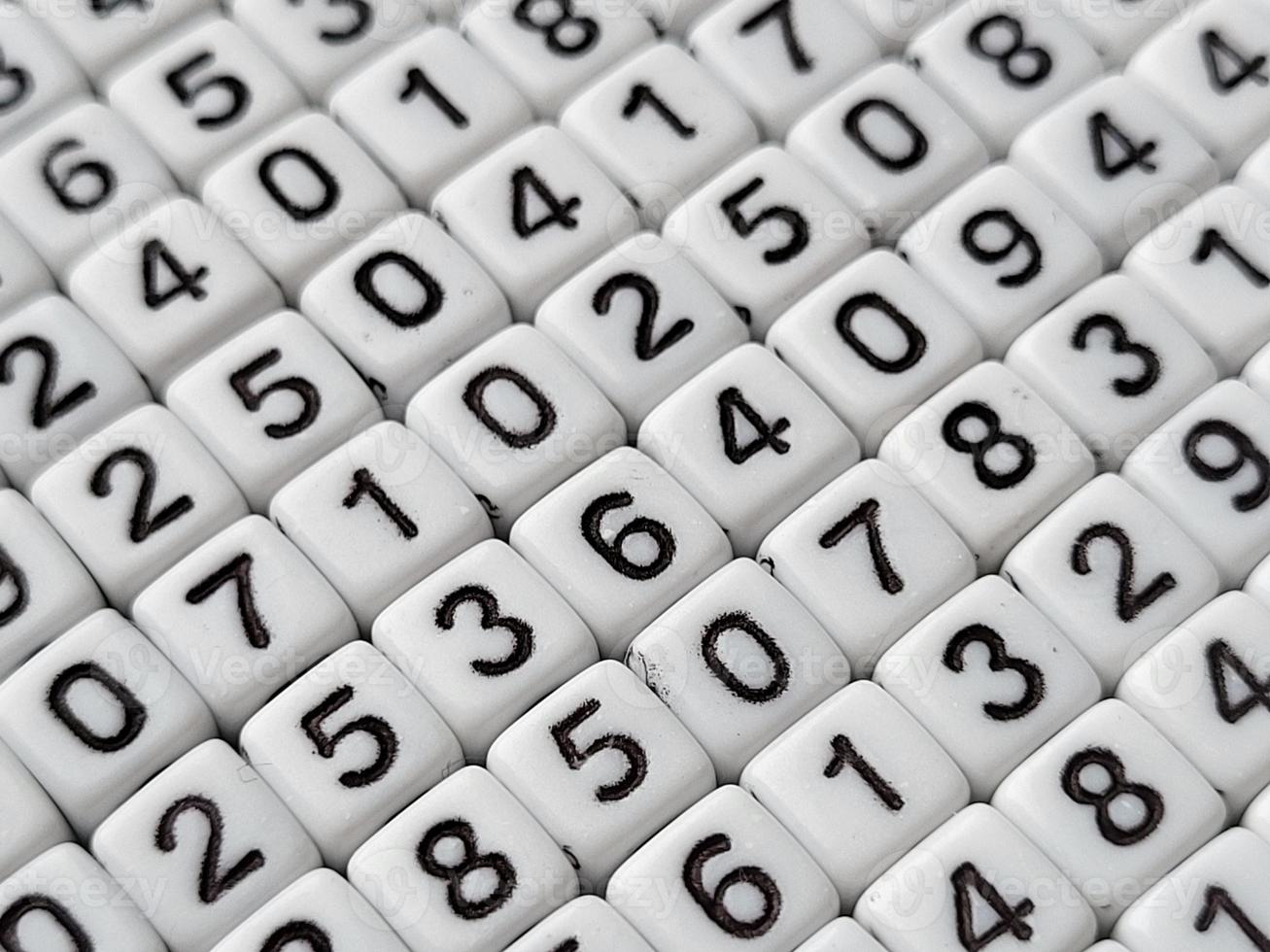 Colorful wooden numbers background. Numbers texture abstraction. Global economy crisis concept. photo
