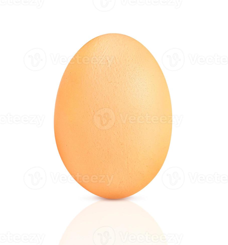 Chicken eggs on white background with reflection photo