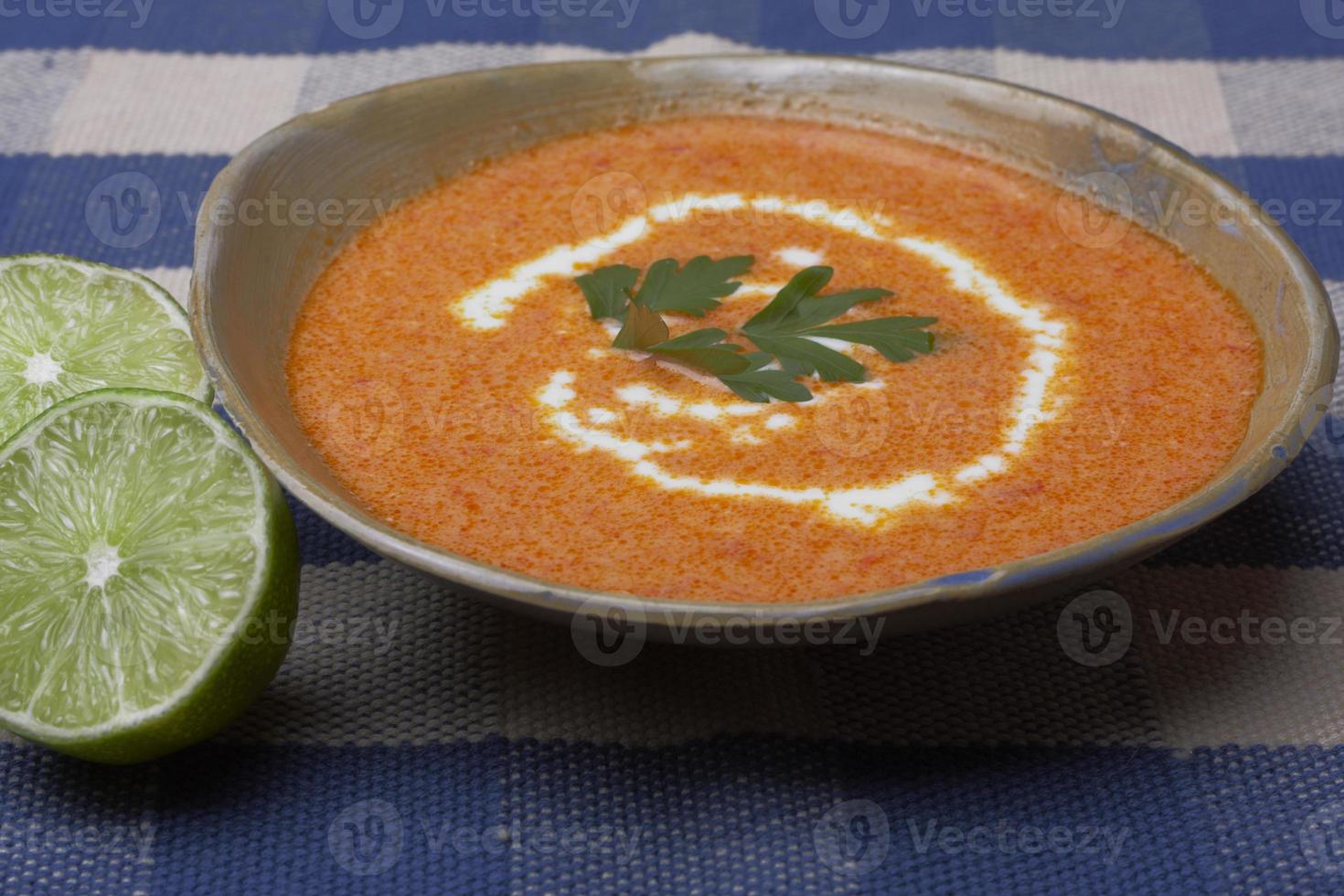 Bowl of Soup with lime photo