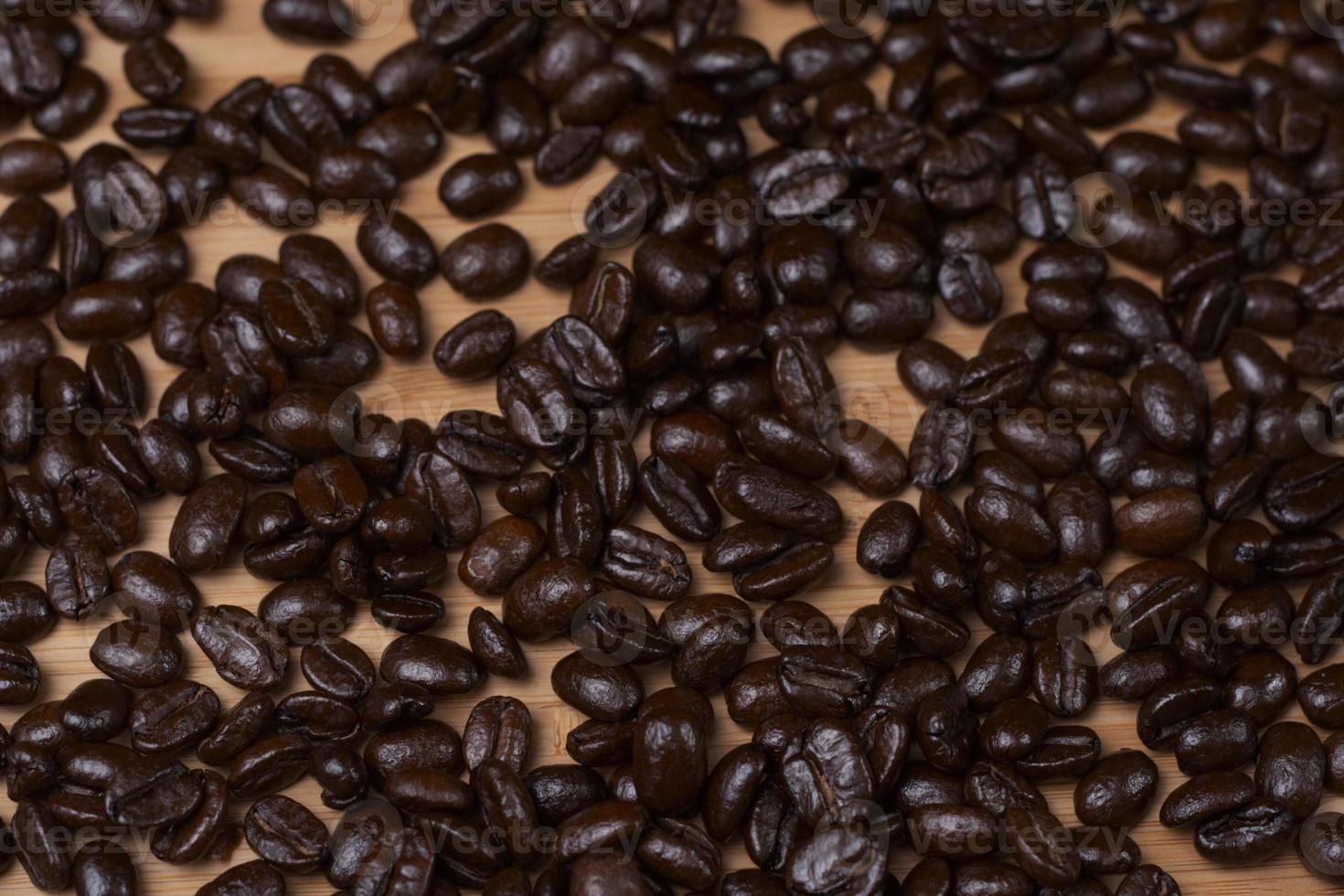 coffee beans wood background photo