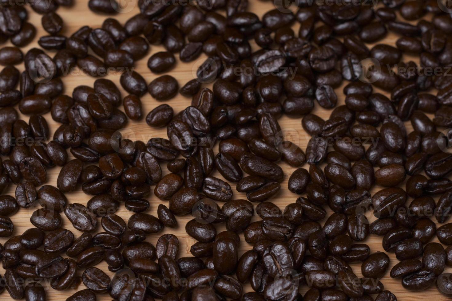 Fondo de madera de granos de café foto