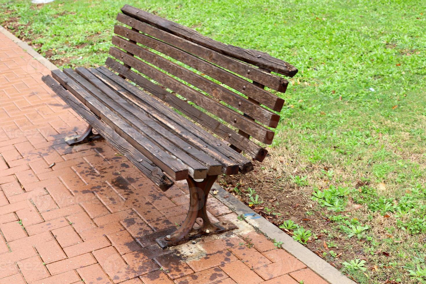 Bench for rest in a city park in Israel. photo