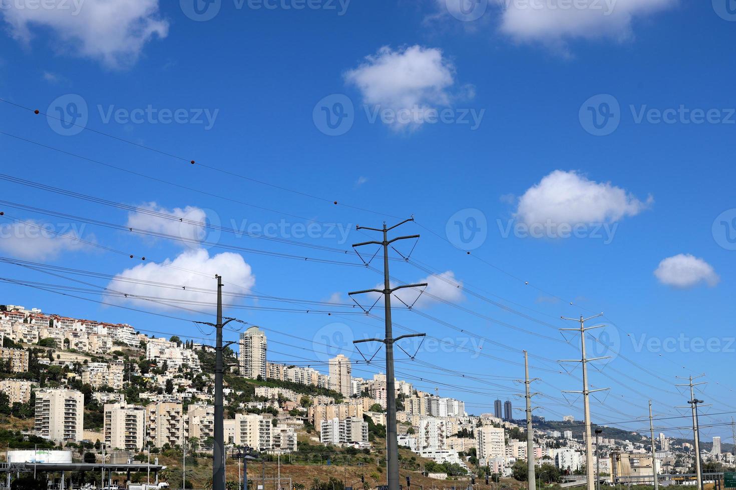 Wires on a pole carrying high voltage electric current. photo