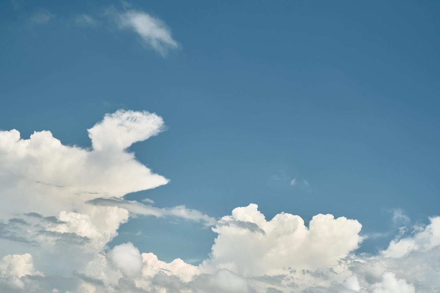 Blue cloudy sky, background for screensaver or wallpaper on the screen or advertising, free space for text. photo