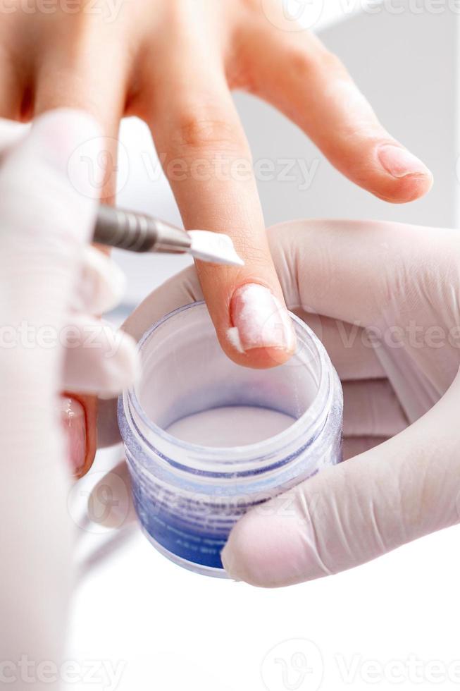 Process of applying acrylic powder on the nails 14564306 Stock Photo at Vecteezy