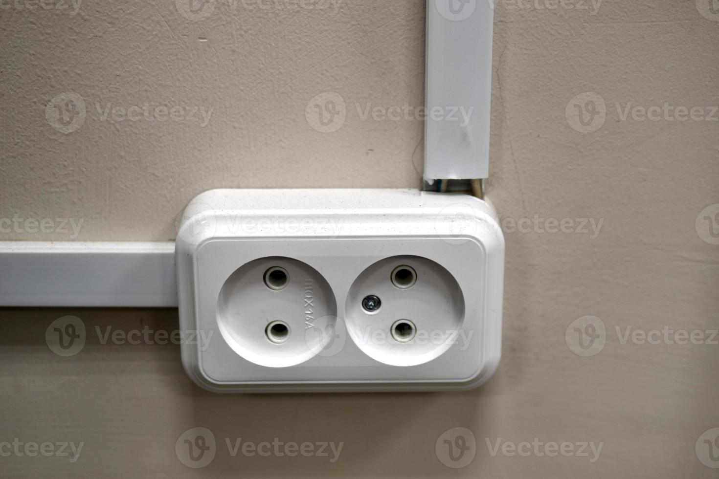 Electrical power outlet for electrical devices. Household electrical outlet. photo