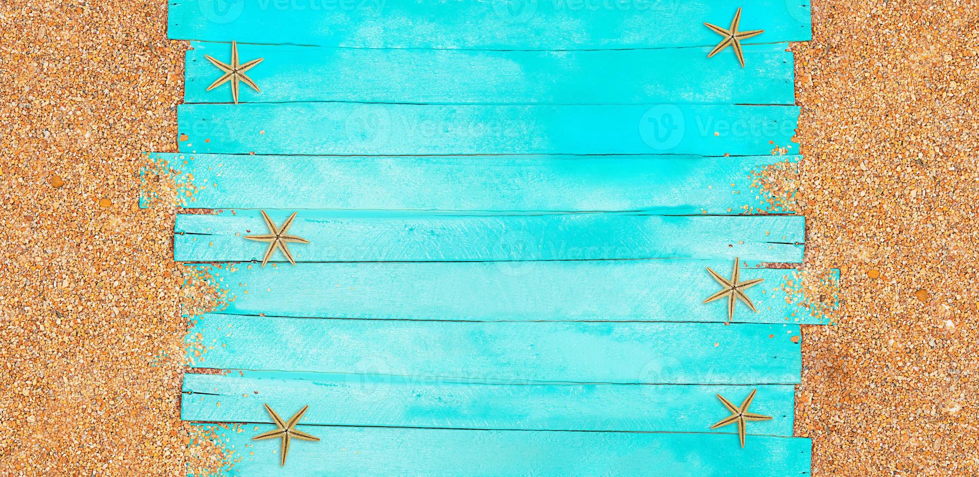 Marine banner. Turquoise horizontal wooden jetty planks with beach pebble sand. Travel and tourism. Copy space photo