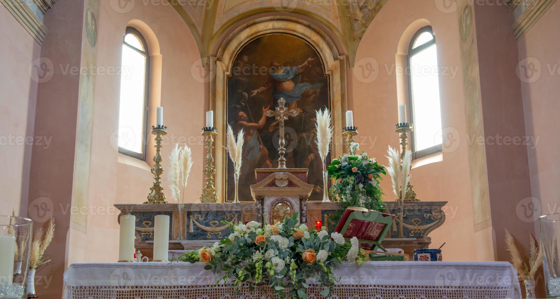 Church decorated for wedding ceremony photo