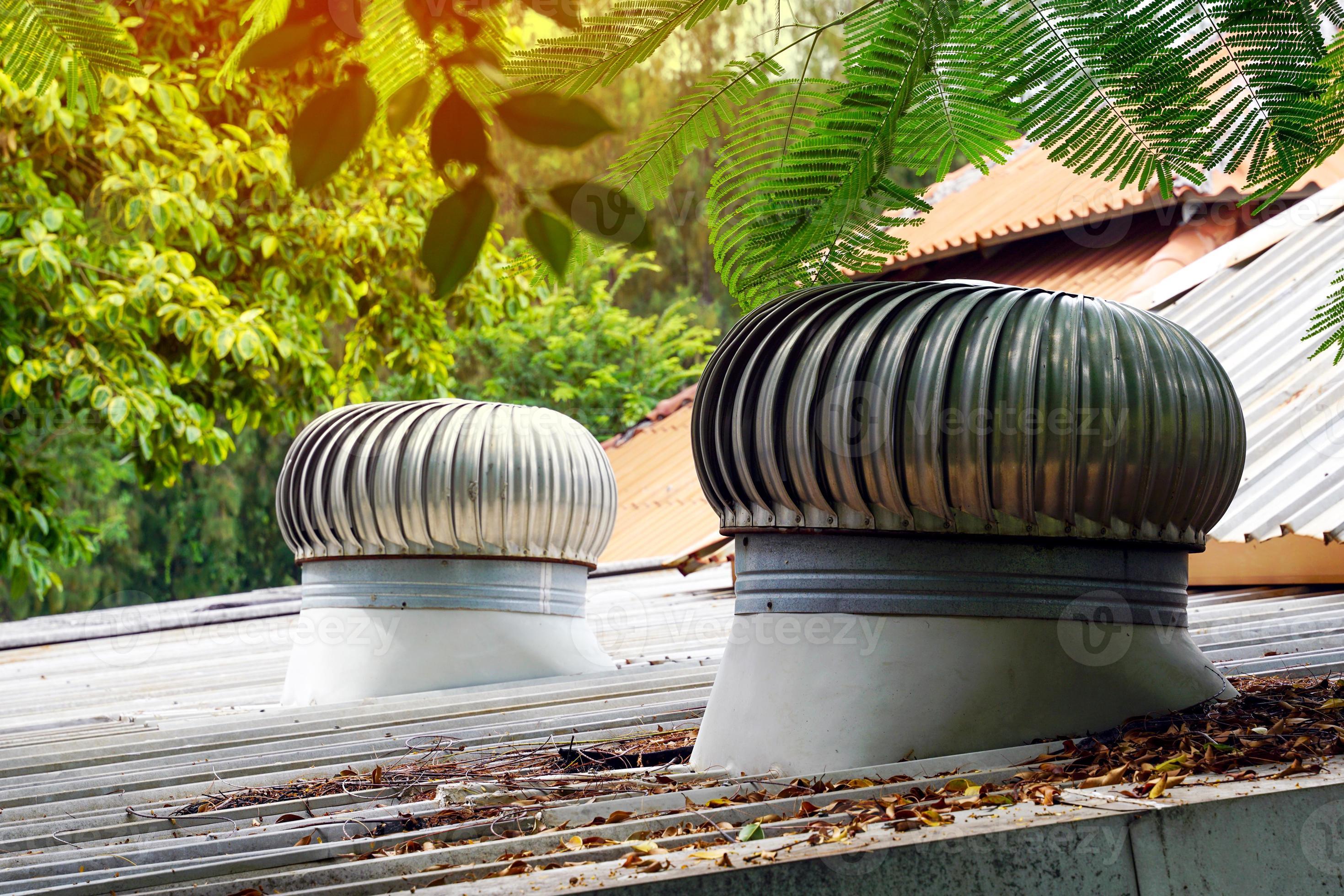 Roof Ventilator installed on the roof of the building to release heat inside the building to work outside the building by using natural wind without using electric power. 14565179 Stock Photo at
