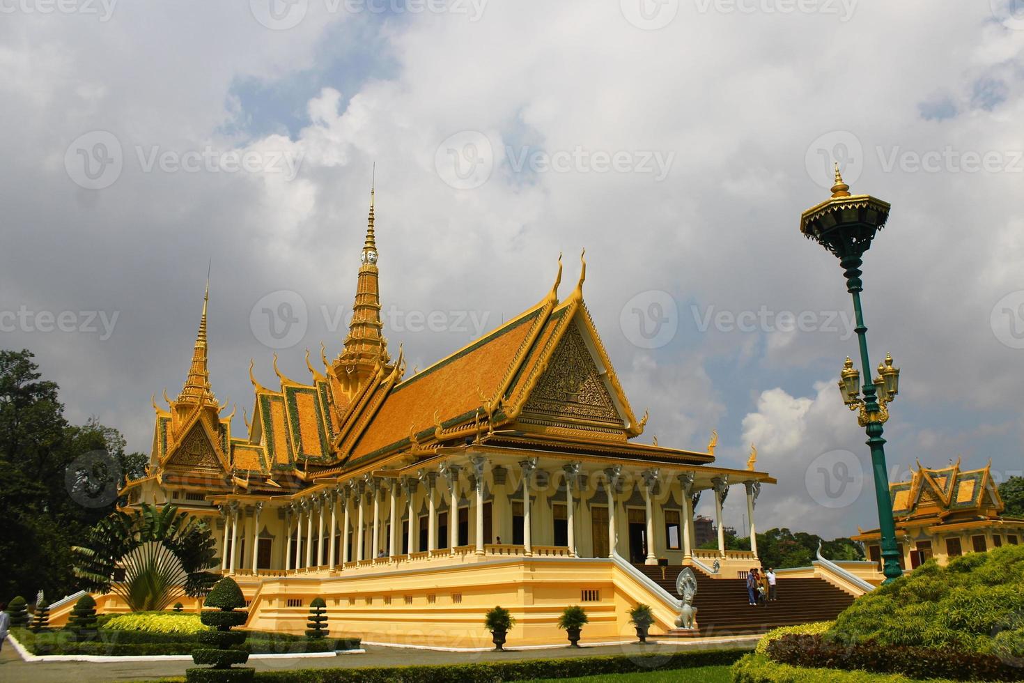 Royal Palace in the city of Phnom Penh in Cambodia with a cloudy sky photo