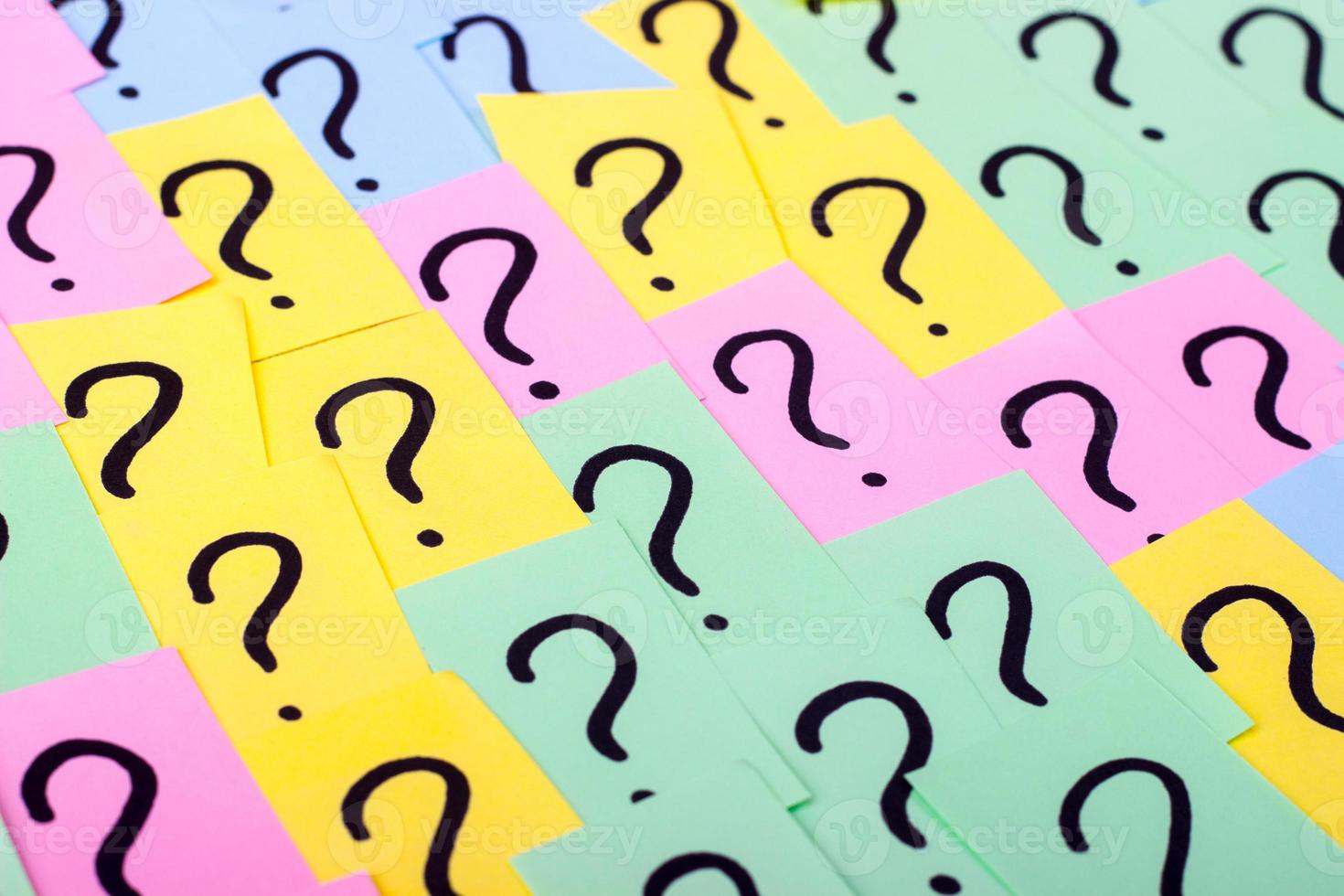 Question marks. Colorful paper notes with question marks. Concept image. Closeup. photo