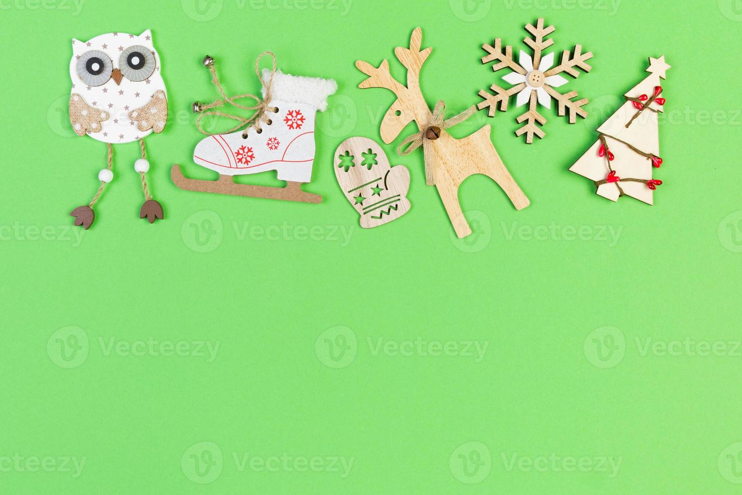 Top view of holiday ornament made of Christmas decorations on colorful background. New Year time concept with copy space photo
