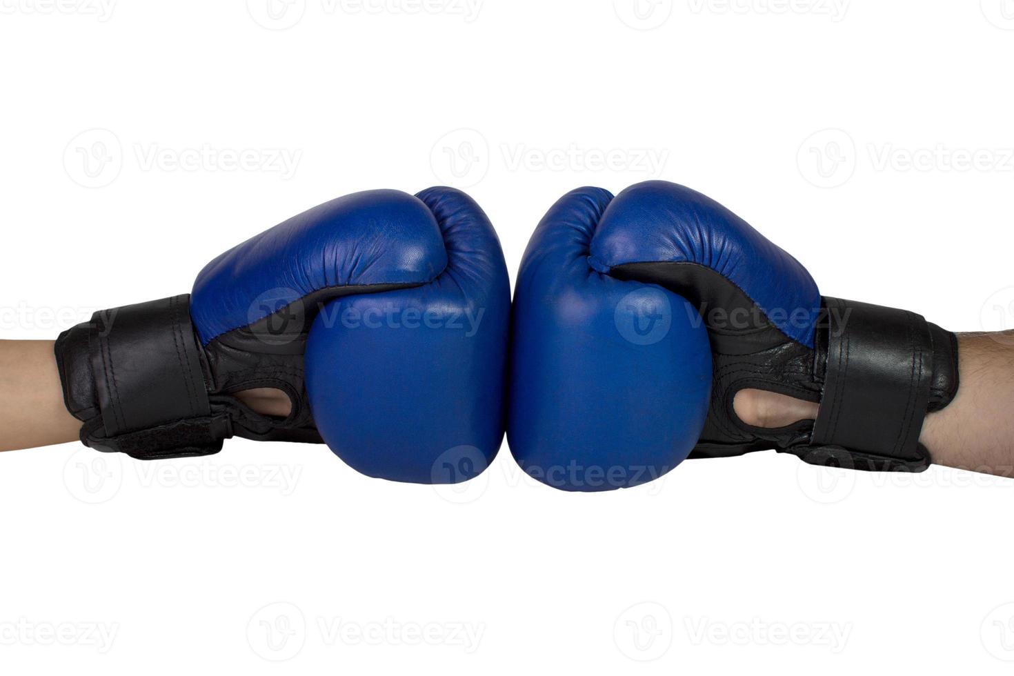 Hanging boxing gloves isolated on white background photo