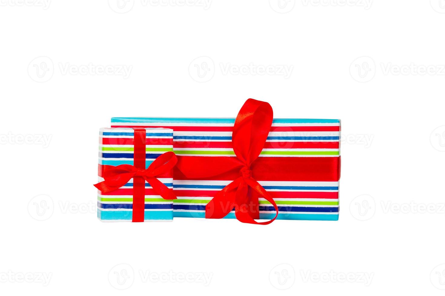 Group of Christmas or other holiday handmade present in colored paper with red ribbon. Isolated on white background, top view. thanksgiving Gift box concept photo